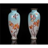 Pair of Japanese cloisonne vases, the fading sky blue ground decorated with autumnal leaves and