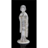 Early 20th Century Japanese ivory Okimono, of a geisha standing with long robes, 12.5cm high