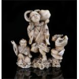 Japanese Meiji period ivory figural group, the central figure with an octopus reaching out of the
