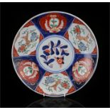 Japanese charger in the Imari pallet decorated with lions and flowers 31cm diameter.