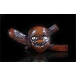 Meiji period boxwood Netsuke No mask of with a slapstick and club, with signature to club 9cm wide