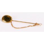 14 carat gold tie pin, with oval medallion top