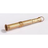 9 carat gold cigar picker, with a push top to the sprung rod