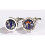 Pair of globe cufflinks, each with a revolving globe