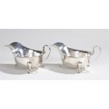 Pair of George V silver sauce boats, Sheffield 1932, maker Emile Viner, with loop handles, wavy rims