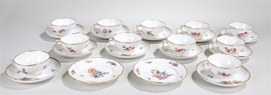Royal Copenhagen tea service, with gilt borders and bodies decorated with floral sprays,