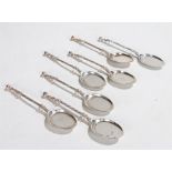 Six silver ice cream spoons, marks rubbed, with stylised figural finials, twisted stems and