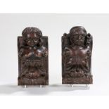 Two oak corbels, carved with a male and female bust above acanthus leaf scroll carved lower