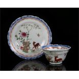 18th Century Chinese famille verte porcelain tea bowl and saucer, decorated with a deer near a large