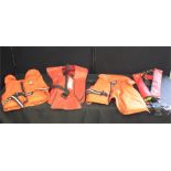 Life vests,to include an XM Quickfit, a Seavest manual gas inflated life jacket, and two Crewsaver