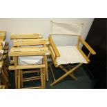 Four folding directors chairs, (4)