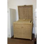 Graduated set of three cube form wicker boxes and covers, (3)