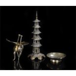 Three Chinese items to include a Chinese brass model of a pagoda, Chinese brass dish, Chinese
