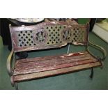 Garden bench, with iron ends, pierced back and slatted seat,