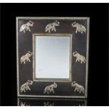 Oriental hardwood mirror with white metal elephant decoration, gadrooned slip and roundel