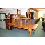 Oak dining table on cabriole legs and later castors, 226cm x 102cm, together with six chairs. five