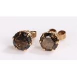 Pair of 9 carat gold garnet set earrings