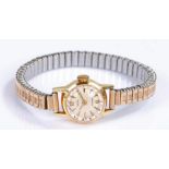 Mudu 18 carat gold ladies wristwatch, the signed silvered dial with an elastic strap