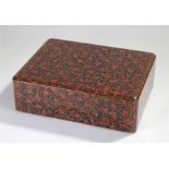 Japanese lacquered box in red and greens, black interior, 35cm long x 28cm wide x 12cm high