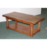 Pine coffee table on turned legs united by a flattened undertier, 121cm by 58.5cm