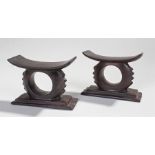 Pair of Ashanti head rests, with arched rests above circular supports and pointed edge, 11cm