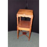 Mahogany wash stand, the square top above an under tier and turned supports, 84cm high