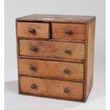 19th Century apprentice piece chest of drawers, with two short above three long drawers, 24cm wide