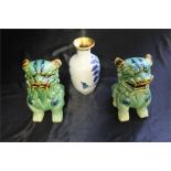 Pair of Chinese pottery dogs of Fo, together with a cloisonné vase, (3)