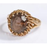 9 carat gold ring, set with a smoky stone, ring size R