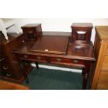 Edwardian writing desk, central writing slope flanked by two panelled cupboards, two frieze