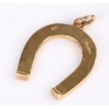 9 carat gold horse shoe pendant, 3.3 grams