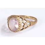 9 carat gold ring, set with a pale purple stone, ring size S