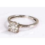 Diamond set ring, the head set with round cut diamonds on a silver shank, ring size K