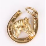 9 carat gold pendant, of a horse and shoe, 2.2 grams