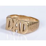 9 carat gold ring, with the word "DAD" 6.3 grams
