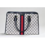 Gucci Anniversary handbag, the cloth bag with red and blue band, leather handles, leather tag to the