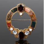 Scottish agate set brooch, with garnets, agates and pearls set to the circular yellow metal