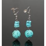 Pair of carved turquoise earrings, with three pebbles above a carved drop, 35mm long