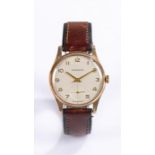 Garrard 9 carat gold cased gentleman's wristwatch, the white dial with gilt Arabic numerals,