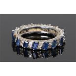 18 carat white gold sapphire and diamond ring, set with emerald cut sapphires and round cut