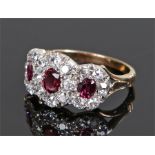 Ruby and diamond set ring, with three rubies at an approximate total carat weight of 1,04 carats and