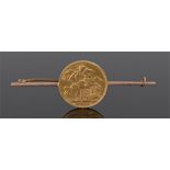 Edwardain Sovereign brooch, the Sovereign dated 1910 attached to the bar brooch, 66mm diameter