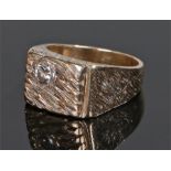 9 carat gold diamond set gentleman's ring, the wide ring with bark effect set with a round cut