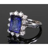 Unusual diamond and intaglio ring, the blue intaglio carved with a crest having twelve round cut