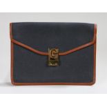 Celine Paris canvas clutch bag, with a gilt metal C clasp, named to the interior Celine Paris