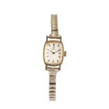 Omega 9 carat gold cased ladies wristwatch, the signed white dial with baton numerals, manual wound,