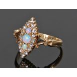 15 carat gold opal and diamond set ring, the navette head set with three opals and a diamond