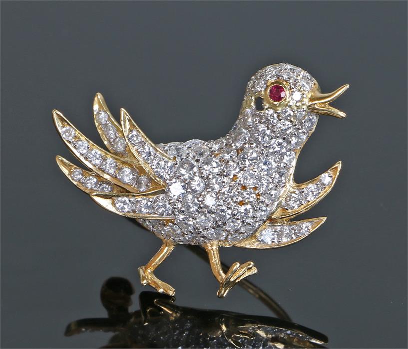 18 carat gold diamond and ruby brooch, as a chick in running position, with a diamond covered body