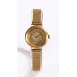 18 carat gold cased ladies wristwatch, the dial with Roman numerals, on a gold coloured mesh