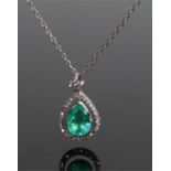 Columbian emerald and diamond set pendant necklace, the Columbian emerald pear cut at 4.03 carats